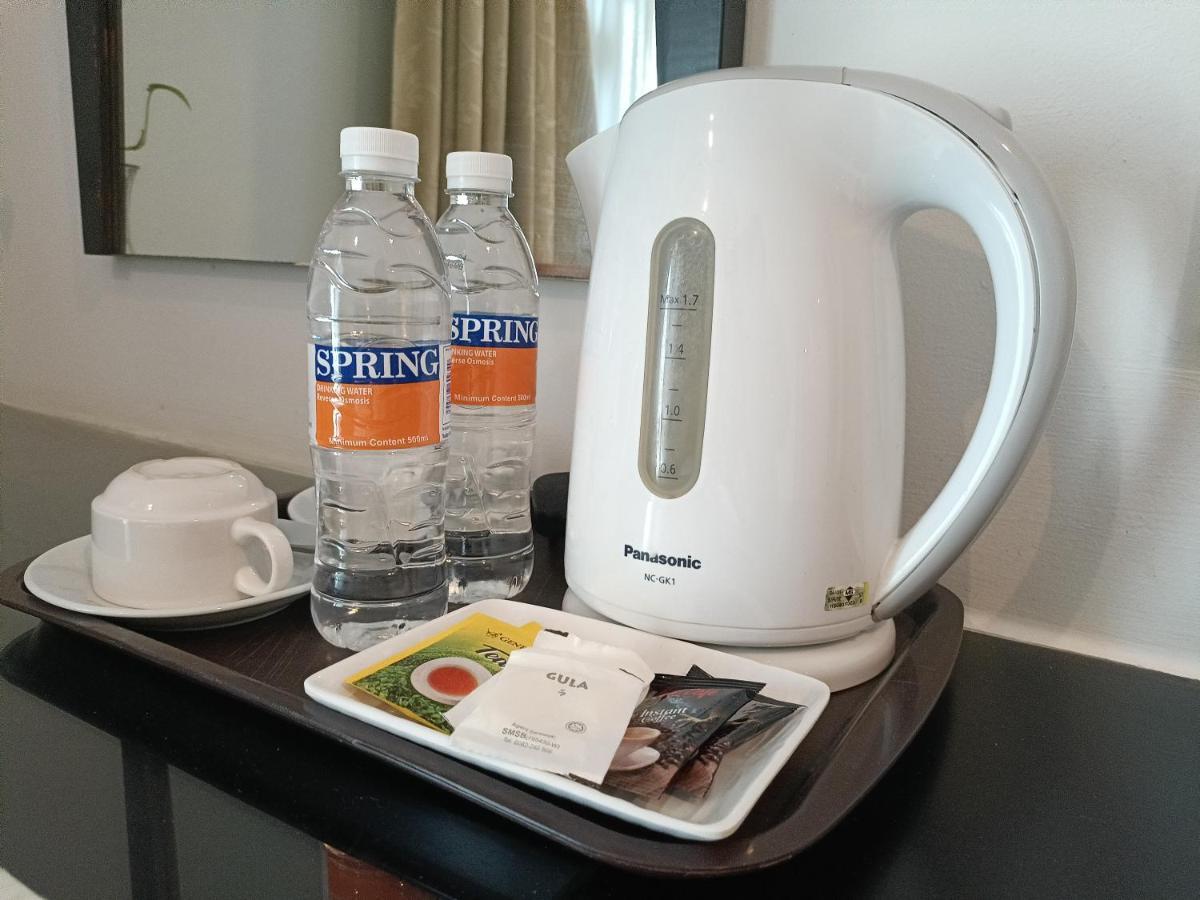Stayinn Gateway Hotel Apartment Kuching Bagian luar foto