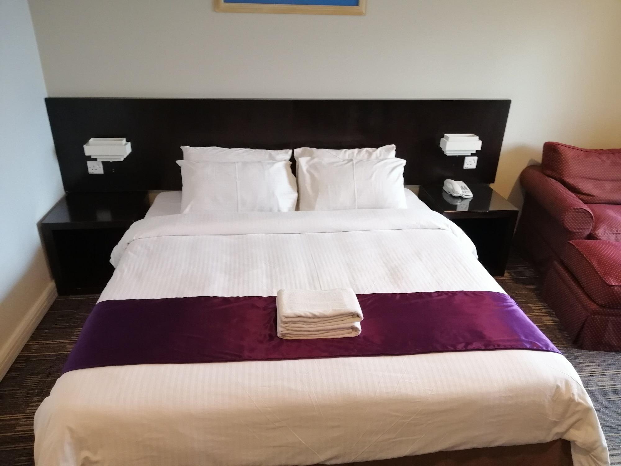 Stayinn Gateway Hotel Apartment Kuching Bagian luar foto