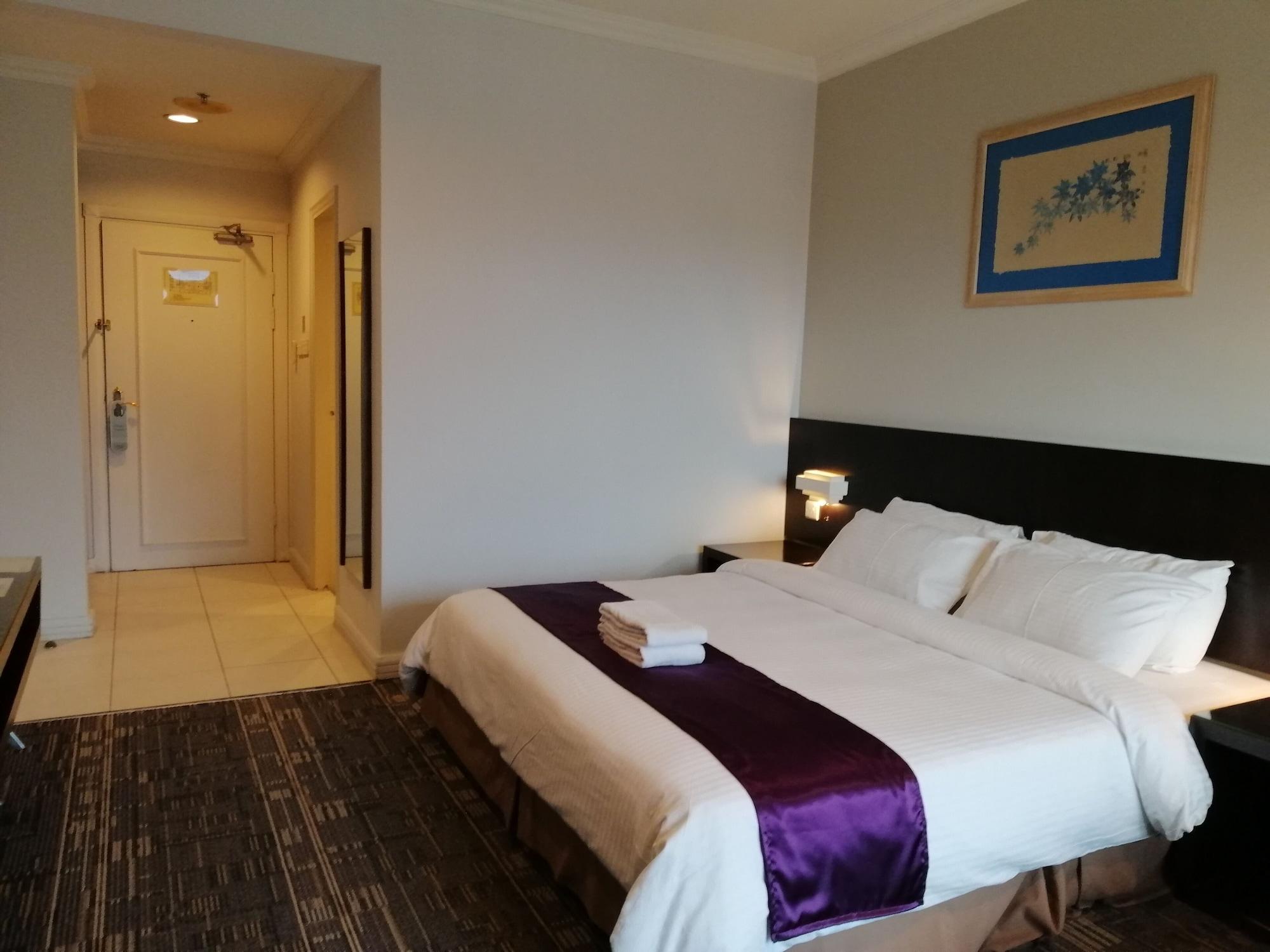 Stayinn Gateway Hotel Apartment Kuching Bagian luar foto